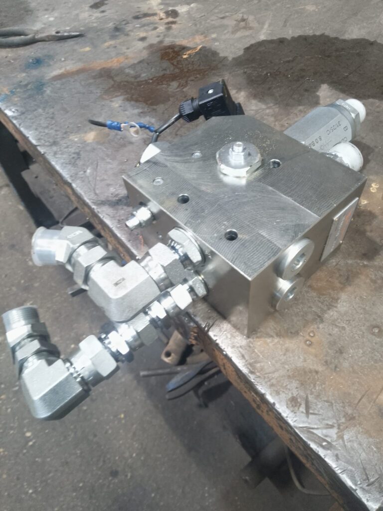 two pump priority flow valve